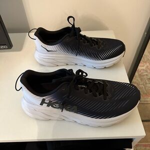 Women’s black HOKA Rincon 3